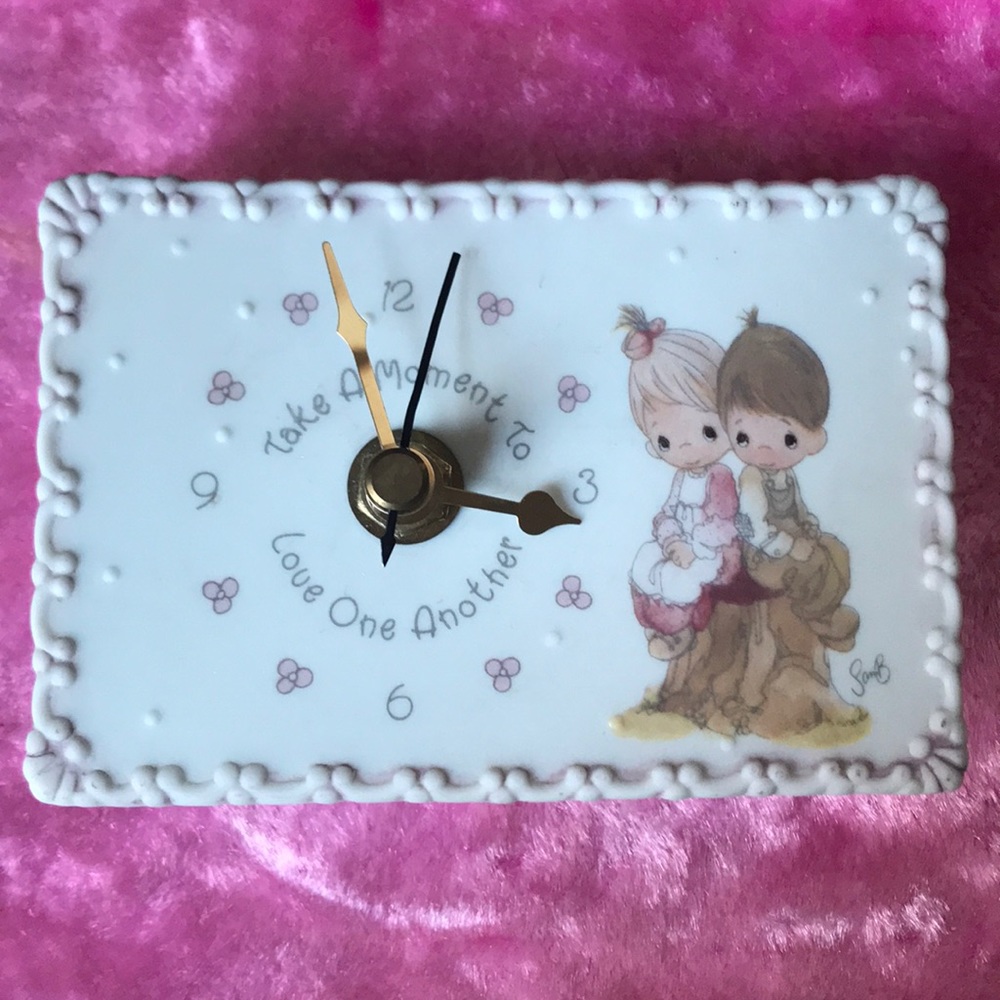 Clock by The Enesco (girl and boy)